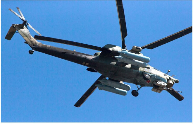 Một chiếc trực thăng tấn công Mi-28 của Nga - Chụp màn hình TASS Một chiếc trực thăng tấn công Mi-28 của Nga - Chụp màn hình TASS