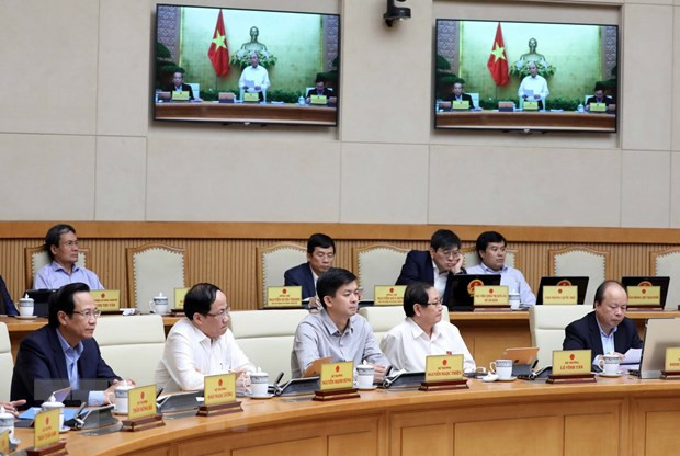 Các thành viên Chính phủ và khách mời tham dự phiên họp. (Ảnh: Thống Nhất/TTXVN)