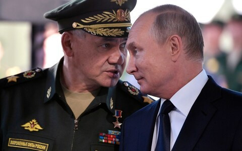 Bộ trưởng Quốc phòng Nga, ông Serge Shoigu và Tổng thống Nga Vladimir Putin. Ảnh: Sputnik
