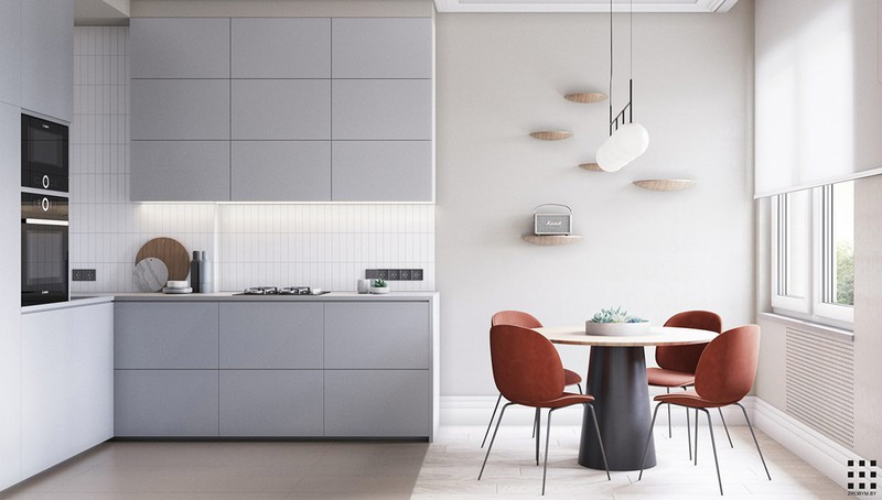 Cửa kính trượt phía sau ghế sofa dẫn đến một nhà bếp nhỏ riêng biệt. Không gian ở đây được phân chia gần như chính xác giữa bàn ăn và tủ bếp.