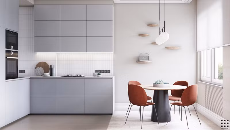 Cửa kính trượt phía sau ghế sofa dẫn đến một nhà bếp nhỏ riêng biệt. Không gian ở đây được phân chia gần như chính xác giữa bàn ăn và tủ bếp.