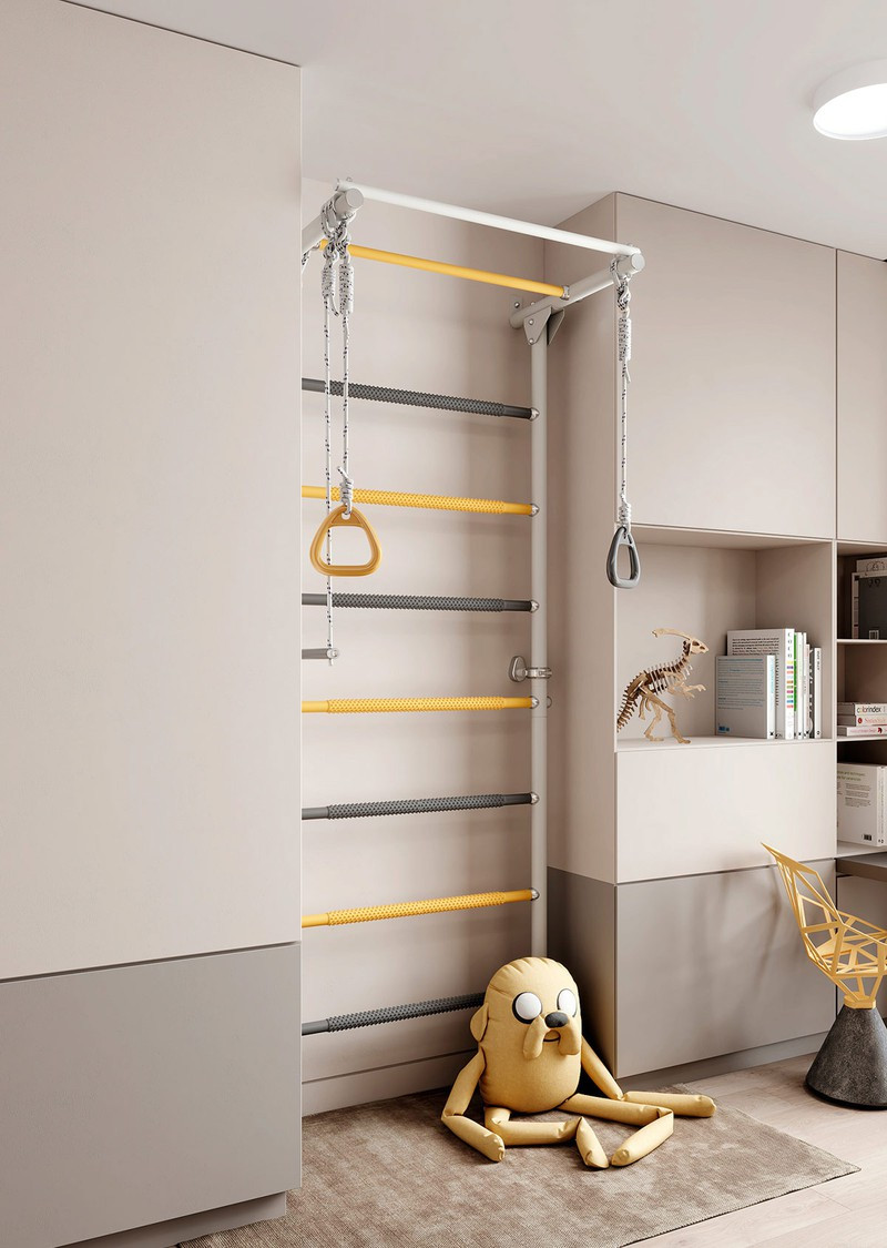 Bức tường leo núi của trẻ em đã được tô màu để phù hợp với phần còn lại của căn phòng. Bức tường leo núi của trẻ em đã được tô màu để phù hợp với phần còn lại của căn phòng.