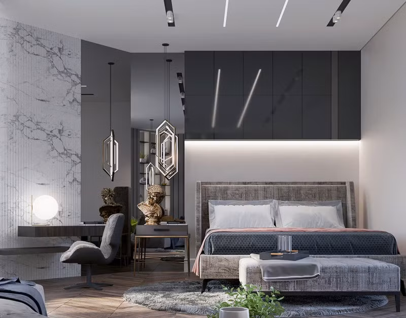 Phòng ngủ rộng rãi trang trí thêm tượng và cây xanh thể hiện đẳng cấp cho người thành đạt.