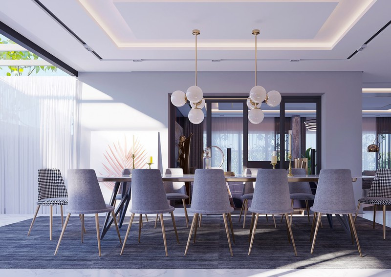 Ghế ăn bọc nệm để các thành viên có thể nán lại lâu hơn trong bữa ăn. Ngoài những chiếc ghế màu xám, hai ghế có họa tiết kẻ sọc giúp không gian phòng ăn có điểm nhấn.