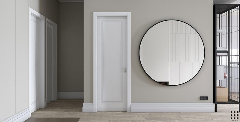  Tại hành lang, chủ nhà gắn một chiếc gương tròn để tăng kích thước cho những căn phòng bên trong