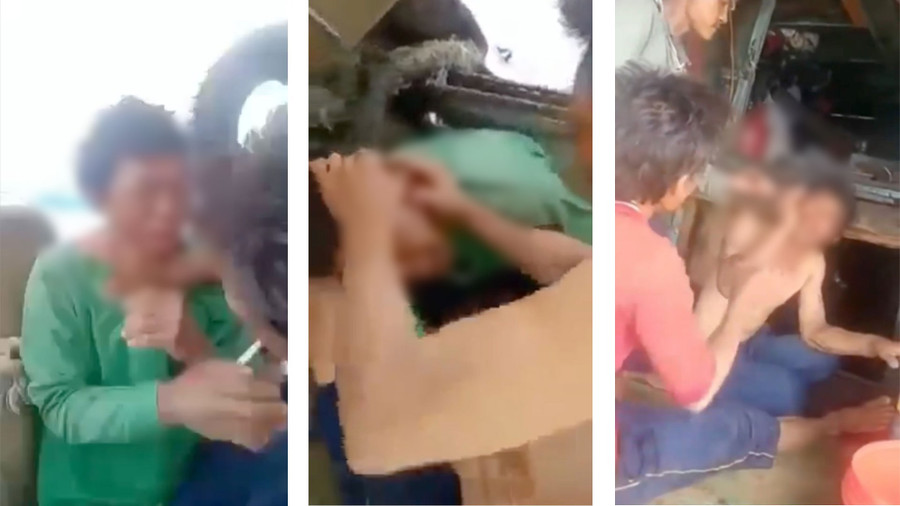 Ngư phủ bị hành hạ trên biển. Ảnh cắt từ clip Ngư phủ bị hành hạ trên biển. Ảnh cắt từ clip