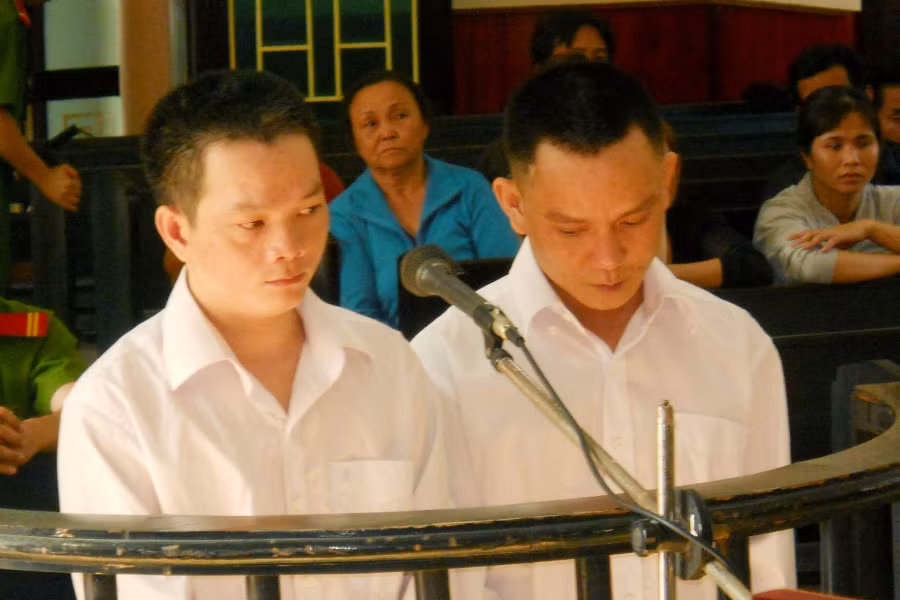 Các bị cáo trước vành móng ngựa. Ảnh: Quang Trung