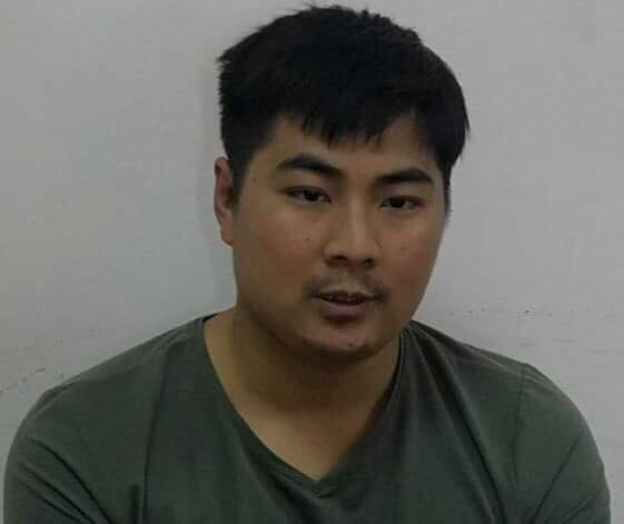 Đối tượng Dương Văn Lộc tại cơ quan điều tra. Ảnh: Công an cung cấp.