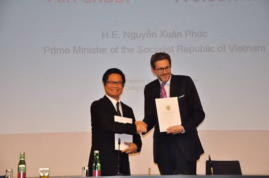  Chủ tịch VCCI Vũ Tiến Lộc và Chủ tịch VKO