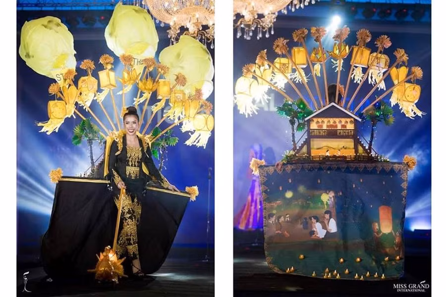 Cô gái cuối cùng có mặt trong top 10 bình chọn là hoa hậu nước chủ nhà Myanmar. Những họa tiết trên trang phục cũng như phụ kiện cầu kỳ khiến khán giả dễ dàng liên tưởng đến những lễ hội đặc sắc ở Mynamar như lễ hội trăng tròn Waso, lễ hội hoa đăng, khinh khí cầu. 