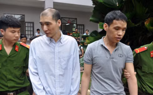 Hai bị cáo người Trung Quốc trong vụ lừa đảo bằng chiêu hù dọa qua điện thoại