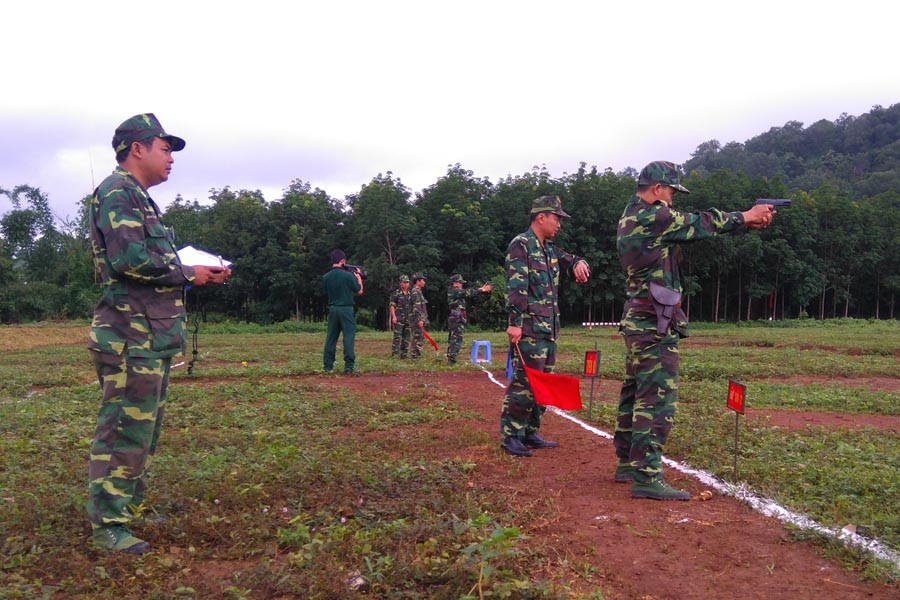 Các vận động viên thực hiện nội dung thi bắn súng ngắn. Ảnh: N.H Các vận động viên thực hiện nội dung thi bắn súng ngắn. Ảnh: N.H