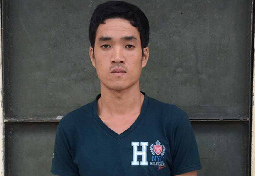 Đối tượng Lê Văn Thiện tại Cơ quan điều tra. Ảnh: Văn Ngọc