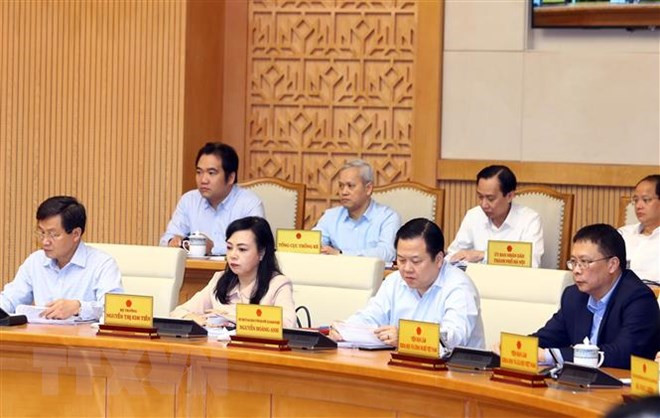 Thành viên Chính phủ và đại biểu tham dự phiên họp. (Ảnh: Thống Nhất/TTXVN)