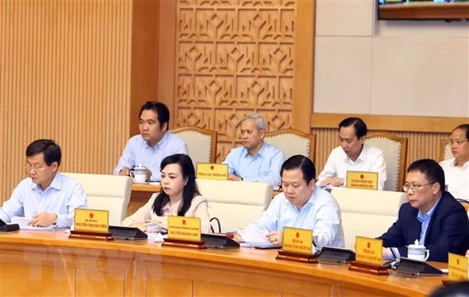 Thành viên Chính phủ và đại biểu tham dự phiên họp. (Ảnh: Thống Nhất/TTXVN)