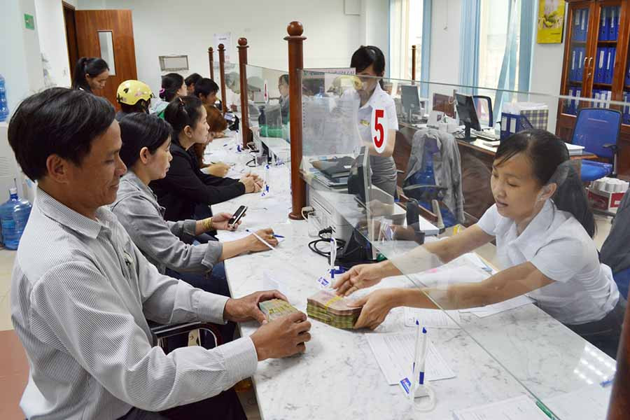  Quầy giao dịch của Vietcombank. Ảnh: Đ.T