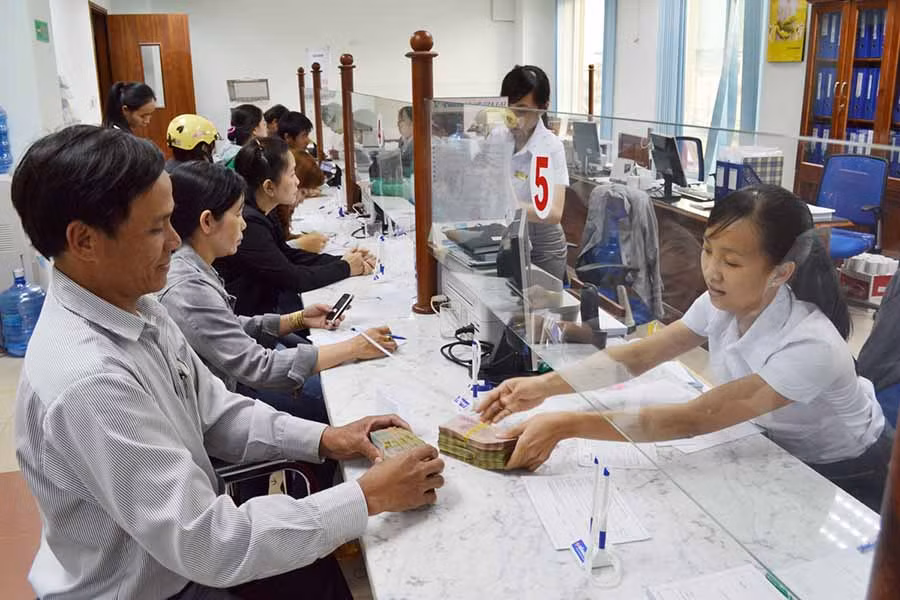  Quầy giao dịch của Vietcombank. Ảnh: Đ.T