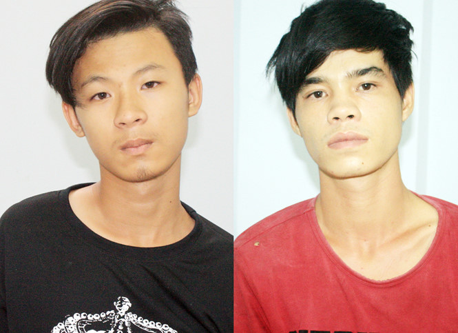 Khang (bên trái) và Sỹ bị bắt tạm giam. Khang (bên trái) và Sỹ bị bắt tạm giam.