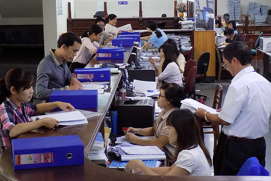  Giải quyết thủ tục hành chính tại Kho Bạc Nhà nước Gia Lai. Ảnh: Thanh Nhật