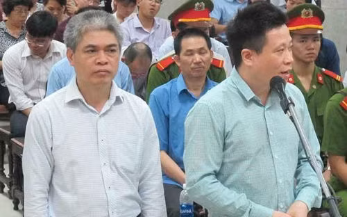 Bị cáo Nguyễn Xuân Sơn và Hà Văn Thắm tại Tòa.