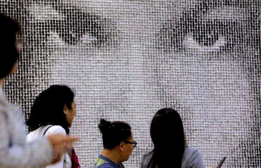 Một tác phẩm trưng bày tại triển lãm. (Ảnh: Thành Đạt/TTXVN) Một tác phẩm trưng bày tại triển lãm. (Ảnh: Thành Đạt/TTXVN)