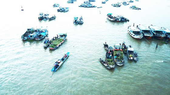 Chợ nổi ở ĐBSCL. Ảnh: NGỌC KHẢI