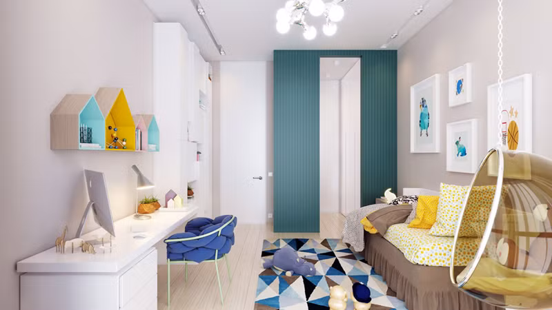 Ngoài chiếc thảm có hình khối đan xen, những bức tranh và hình ngôi nhà nhỏ được treo trên tường đã tô điểm hơn cho phòng của trẻ.