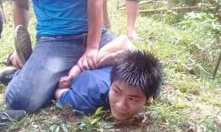 Nghi phạm Đỗ Mãnh Chiểu Minh lúc bị công an khống chế, bắt giữ khi đang bỏ trốn