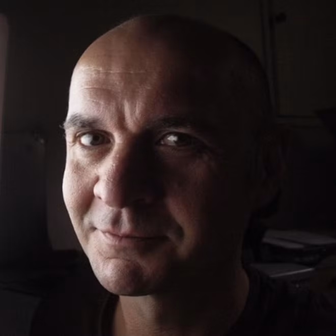 Chân dung tiến sĩ Gerard Cheshire, người giải mã thành công bản thảo Voynich. Ảnh: Academic.