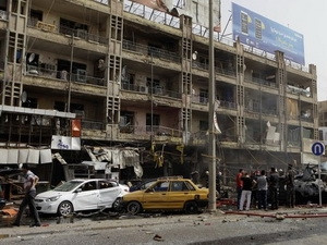 Hiện trường một vụ đánh bom xe ở Baghdad, Iraq.