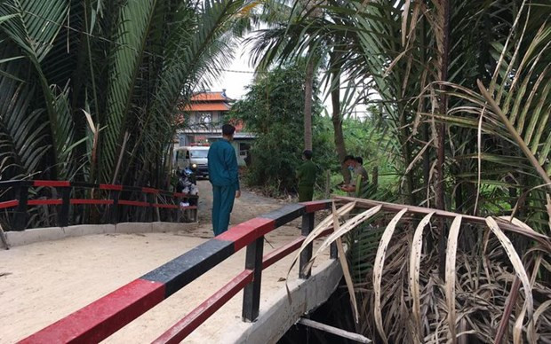  Công an phong tỏa nơi xảy ra vụ án. (Nguồn: sggp)