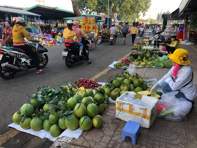 Những dấu hiệu tết đến xuất hiện ngay từ các khu chợ. Ảnh: LÊ THANH Những dấu hiệu tết đến xuất hiện ngay từ các khu chợ. Ảnh: LÊ THANH