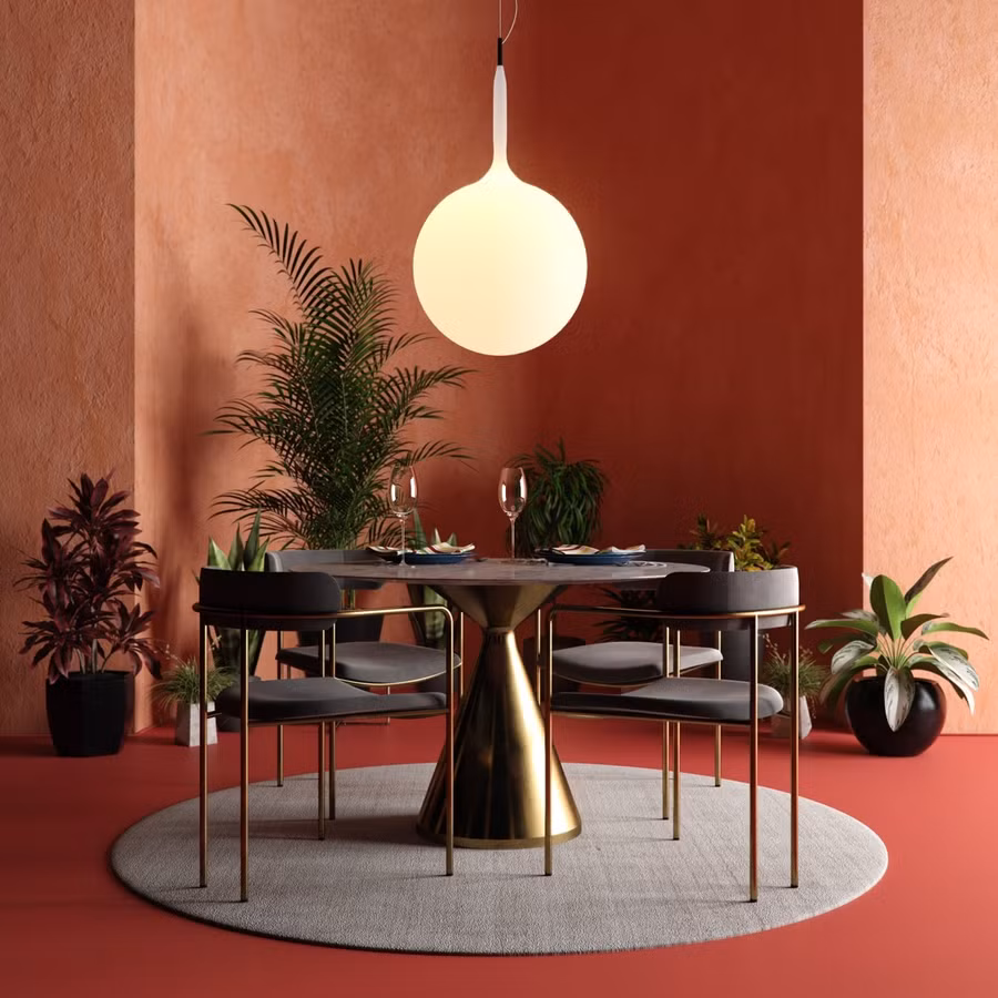 Màu đỏ kết hợp với những khối tròn là chủ đạo trong gian bếp này. Đỏ và tròn. Tấm thảm màu xám trung hòa giữa nền nhà và tường đều có màu nóng, trong đó đèn chùm hình quả cầu lớn làm điểm nhấn độc đáo trong gian bếp.