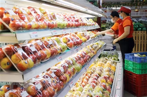 Giá cả hàng hóa ổn định trong ngày mùng 3 Tết Nguyên đán. (Ảnh: Mỹ Phương/TTXVN)