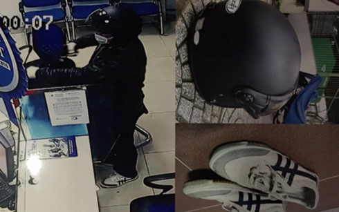Hình ảnh đối tượng dùng súng cướp ngân hàng (chụp qua video camera an ninh) Hình ảnh đối tượng dùng súng cướp ngân hàng (chụp qua video camera an ninh)