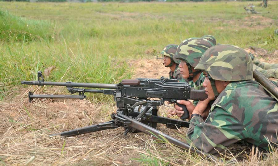 Tổ súng máy phòng không PKMS theo dõi bám sát mục tiêu. Ảnh: Vũ Duy Tổ súng máy phòng không PKMS theo dõi bám sát mục tiêu. Ảnh: Vũ Duy
