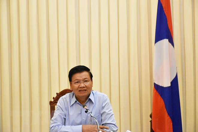 Thủ tướng Lào Thongloun Sisoulith chủ trì cuộc họp báo về sự cố đập thủy điện tại thủ đô Vintiane. (Nguồn: THX/TTXVN) Thủ tướng Lào Thongloun Sisoulith chủ trì cuộc họp báo về sự cố đập thủy điện tại thủ đô Vintiane. (Nguồn: THX/TTXVN)
