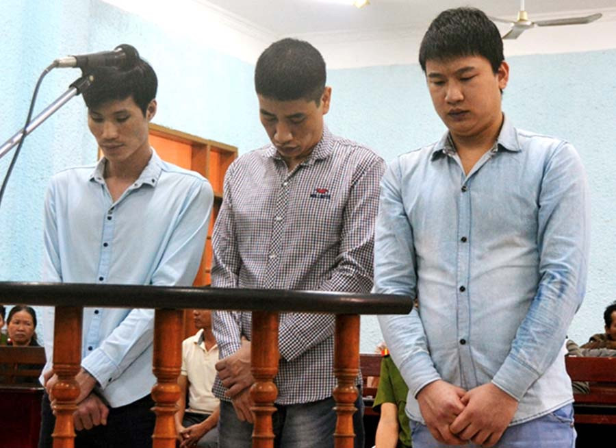 Các bị cáo trước vành móng ngựa. Ảnh: Duy Anh