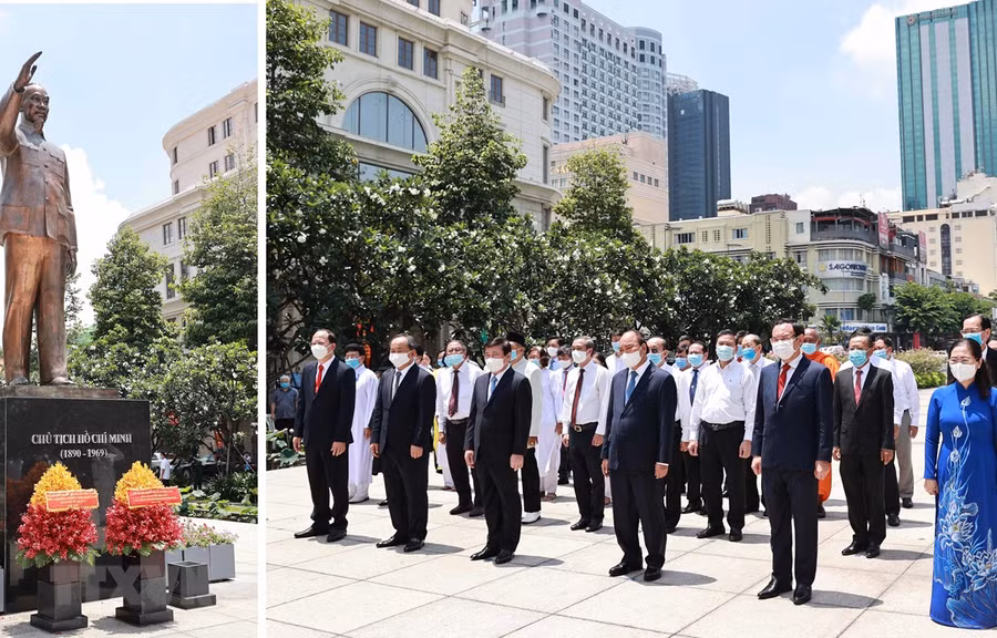 Chủ tịch nước Nguyễn Xuân Phúc dâng hoa tại Công viên Tượng đài Chủ tịch Hồ Chí Minh. (Ảnh: Thống Nhất/TTXVN)