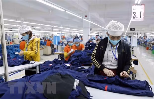 May hàng xuất khẩu sang thị trường Nhật Bản của CTCP may Hưng Việt, huyện Mỹ Hào, tỉnh Hưng Yên. (Ảnh: Trần Việt/TTXVN)