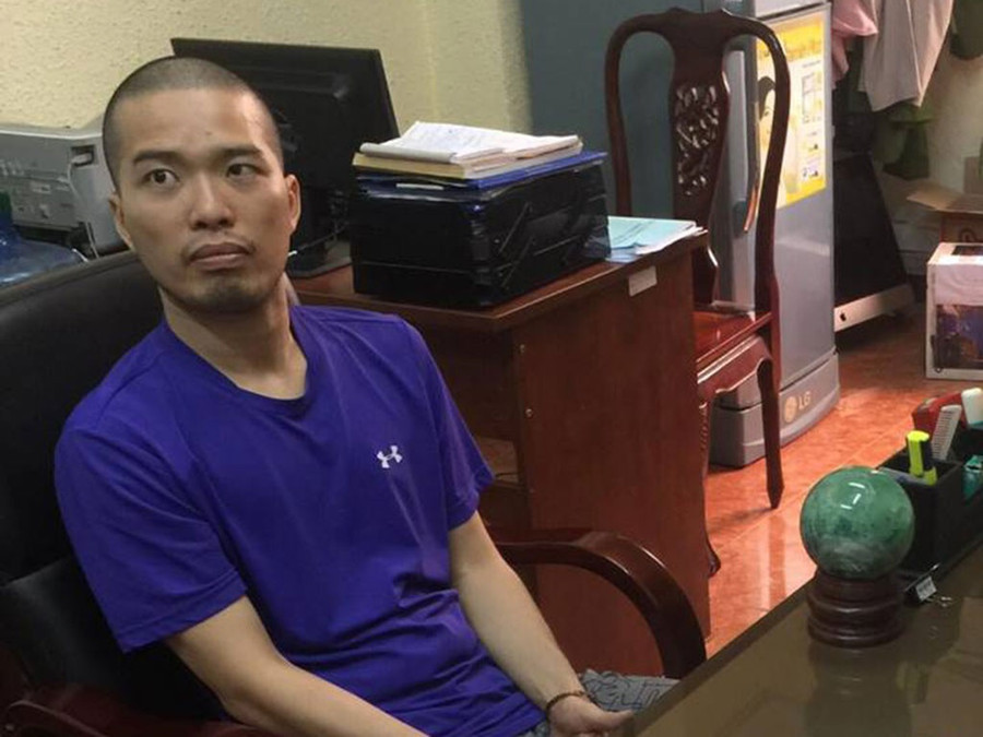 Nguyễn Minh Đạt khi bị bắt - ẢNH: Thanh Truyền  Nguyễn Minh Đạt khi bị bắt - ẢNH: Thanh Truyền