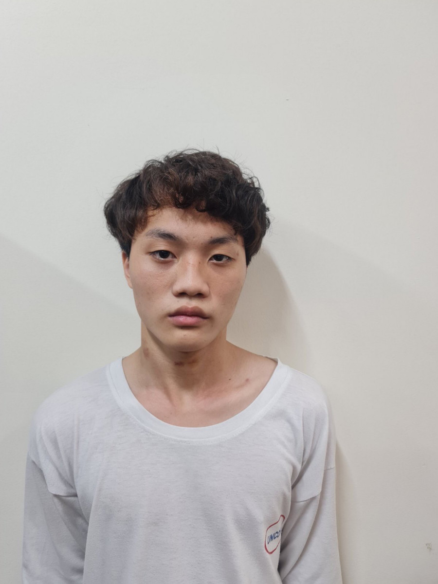 Nguyễn Ngọc Hưng tại trụ sở công an.