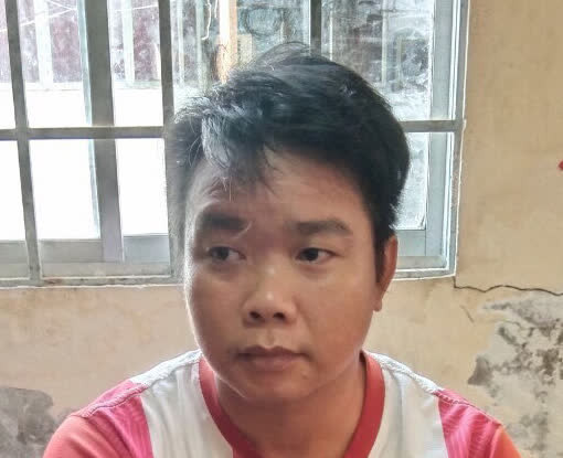 Phan Lê Tuấn sau khi bị bắt. Ảnh: T.Long Phan Lê Tuấn sau khi bị bắt. Ảnh: T.Long