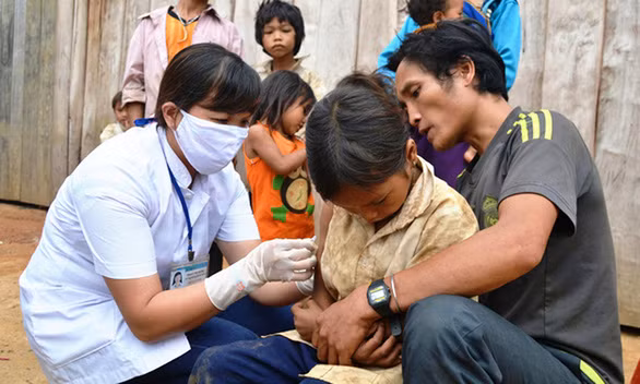 người dân nơi ổ dịch Phước Lộc năm 2015 - Ảnh: LÊ TRUNG