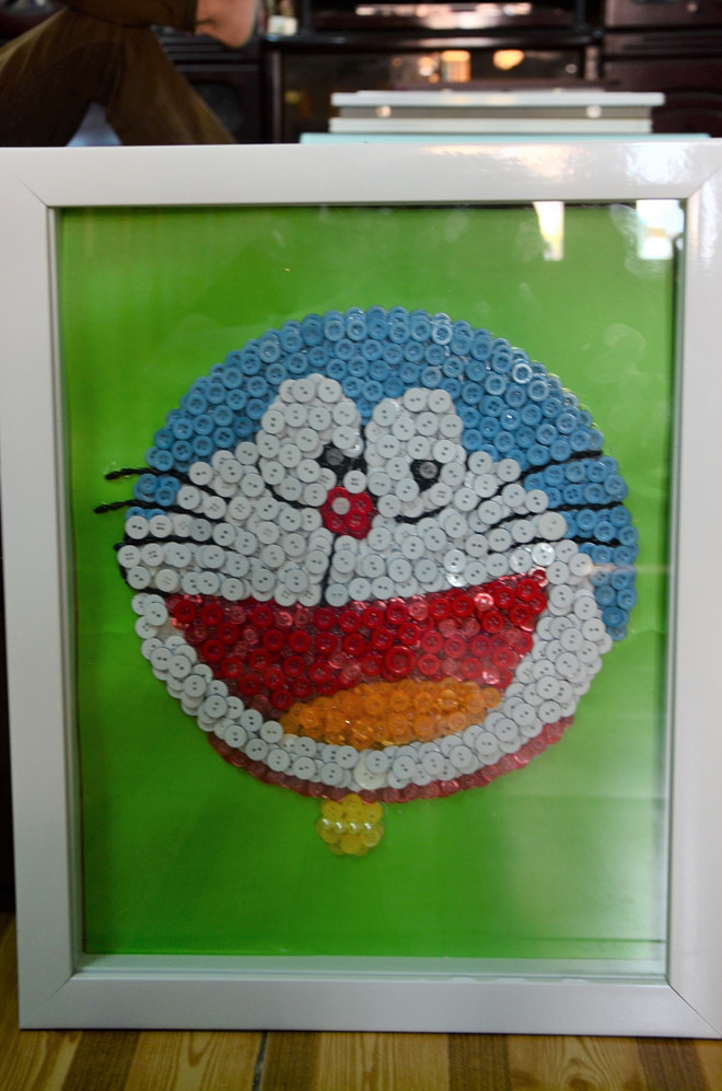 Đây là bức tranh mà Thành tốn gần 1.000 nút áo để làm được