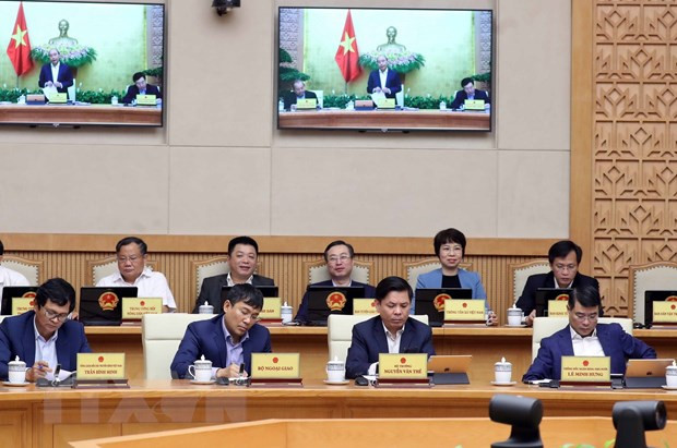 Thành viên Chính phủ và khách mời dự phiên họp Chính phủ thường kỳ tháng Hai năm 2020. (Ảnh: Thống Nhất/TTXVN)