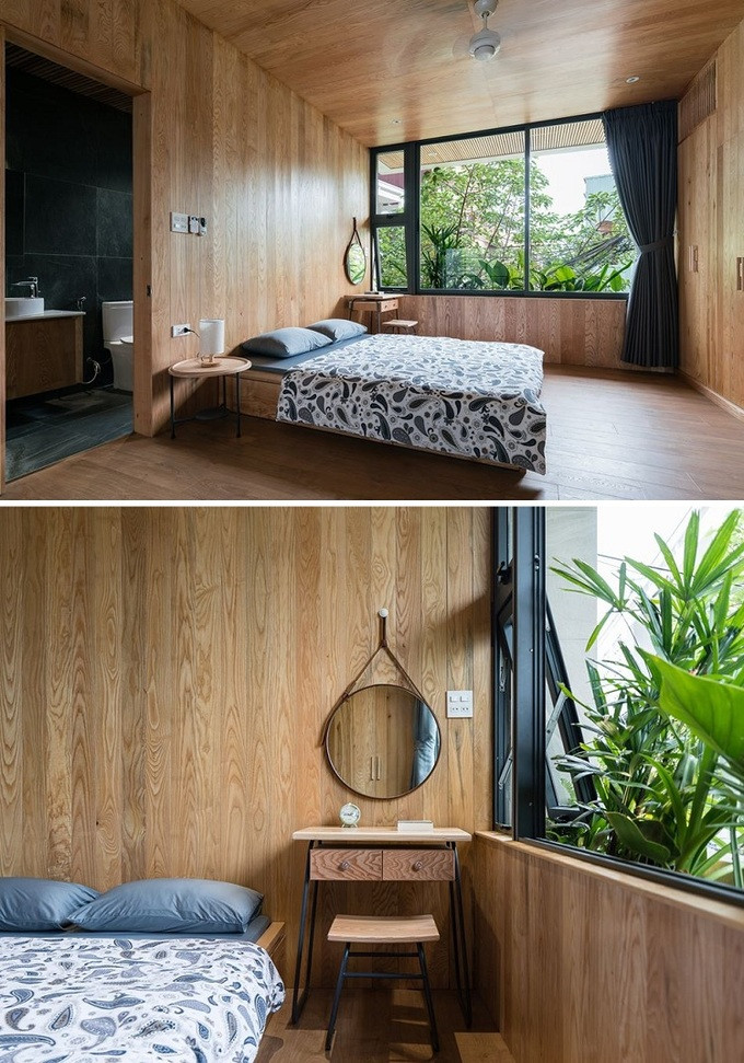 Nhà vệ sinh và hệ thống tủ có cửa cùng chất liệu với tường, trần của phòng ngủ, tạo sự đồng bộ cho không gian. Đặc biệt, trước mỗi tầng có khoảng vườn nhỏ để chắn gió Lào và đèn xe đi vào hẻm. Nhà vệ sinh và hệ thống tủ có cửa cùng chất liệu với tường, trần của phòng ngủ, tạo sự đồng bộ cho không gian. Đặc biệt, trước mỗi tầng có khoảng vườn nhỏ để chắn gió Lào và đèn xe đi vào hẻm.