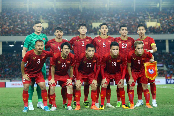 Nguyễn Tuấn Anh (14) và Nguyễn Văn Toàn (9) trong màu áo đội tuyển Việt Nam. Ảnh: QUANG THẮNG