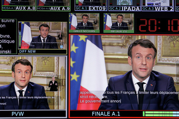 Tổng thống Pháp Emmanuel Macron thông báo với người dân kế hoạch đóng cửa tất cả trường học kể từ tuần sau nhằm ngăn chặn dịch COVID-19 trong bài phát biểu được truyền hình trực tiếp ngày 12-3 - Ảnh: AFP
