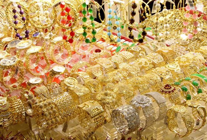 Giá vàng đi lên sau khi giảm nhẹ trong ngày 11.3 - Ảnh: Khả Hòa